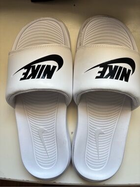 Nike White Slide Sandals with Black Swoosh